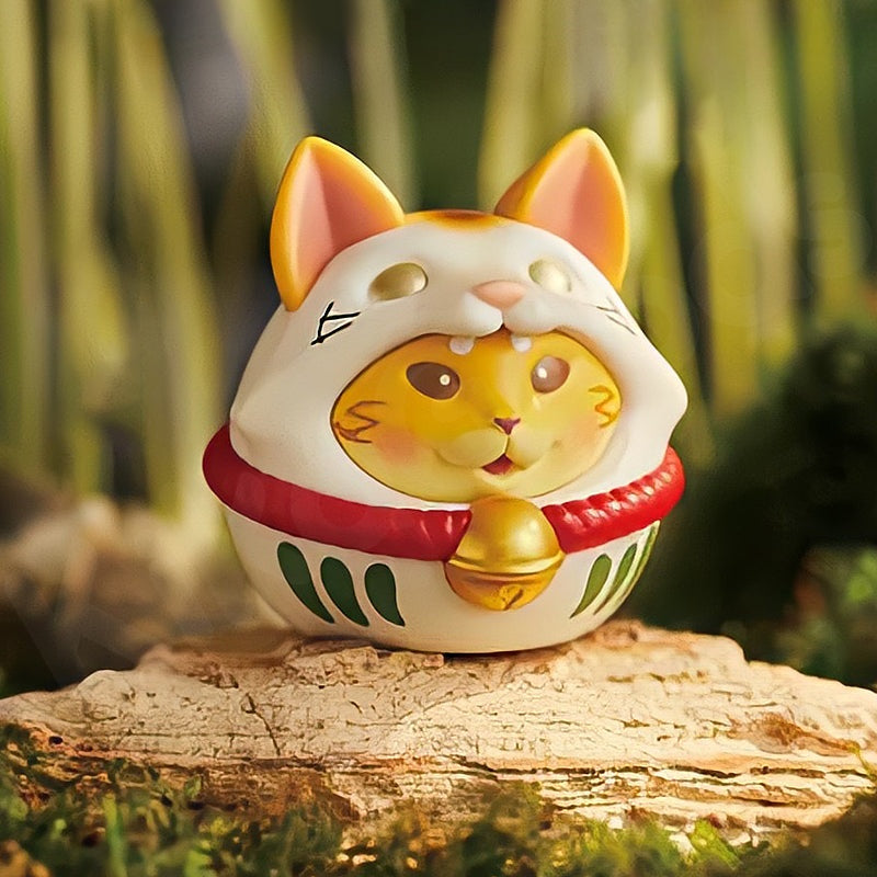 Cat-shaped decorative item with a traditional design on a wooden log with a natural background