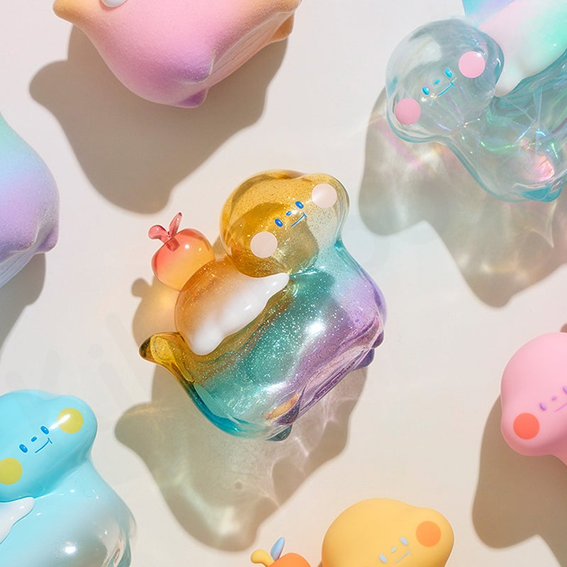 Colorful silicone animal-shaped products on a light background