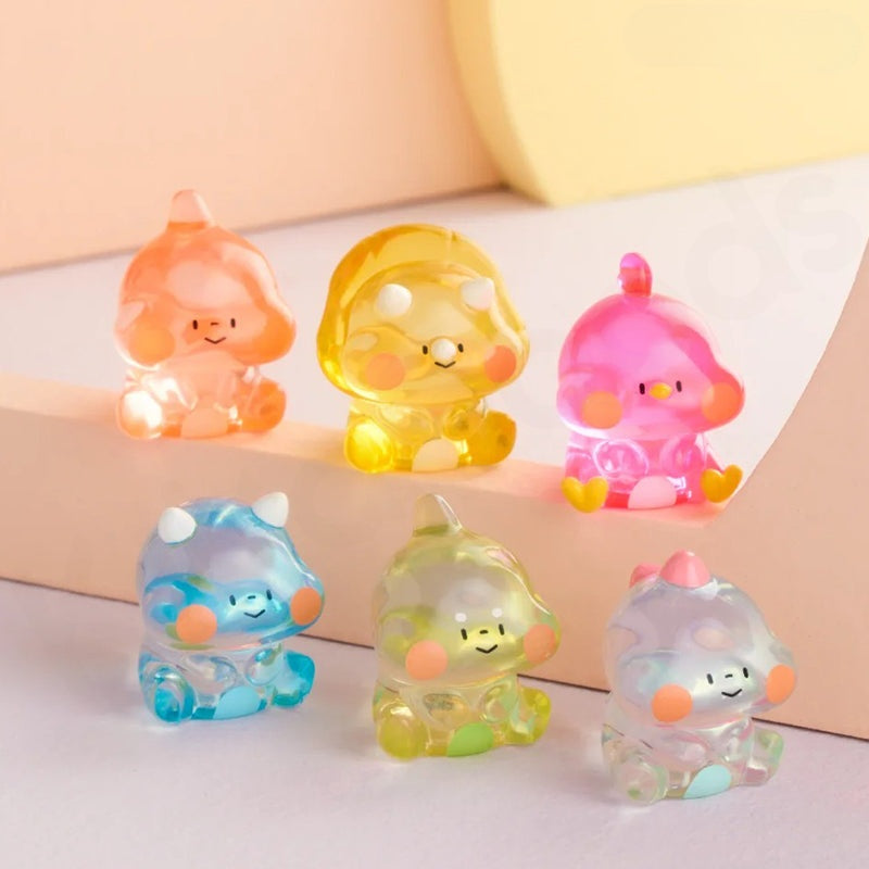 Set of colorful cartoon-like figurines on a light background