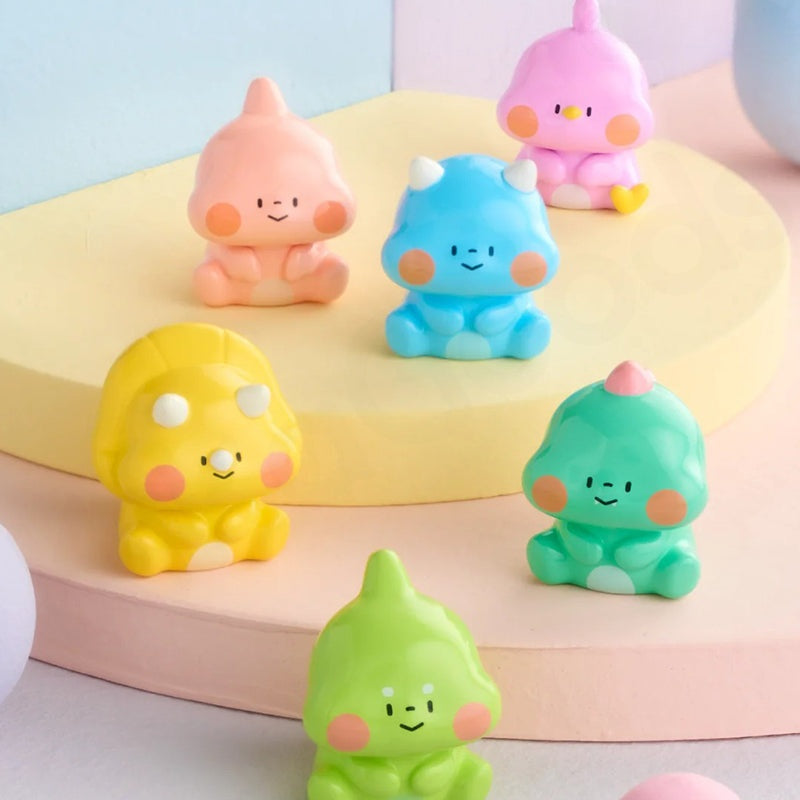Set of colorful cartoon-like figurines on a pastel background