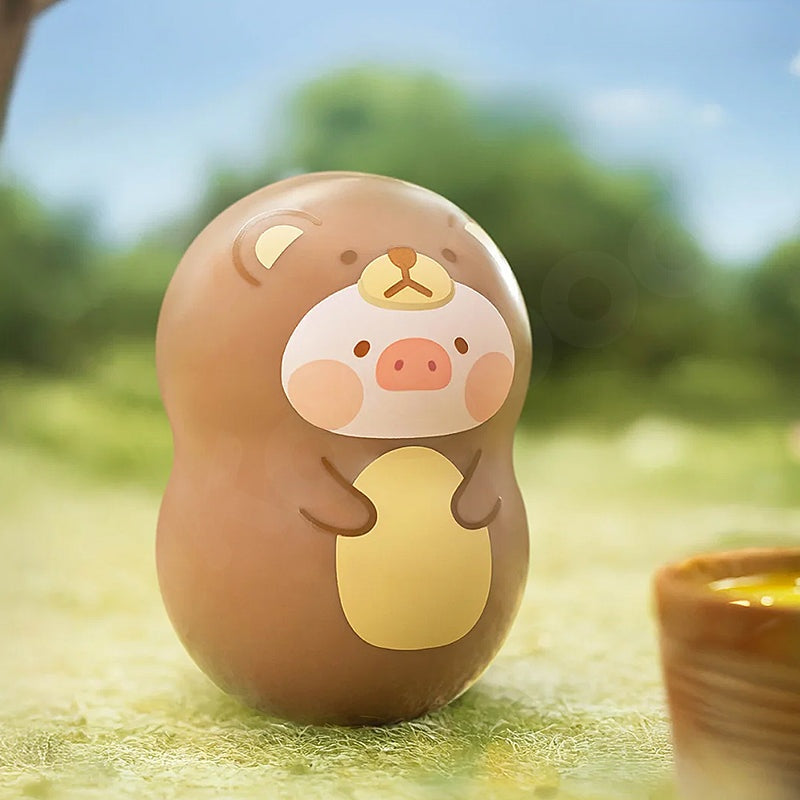 Cute cartoon character in a brown and yellow outfit against a blurred outdoor background