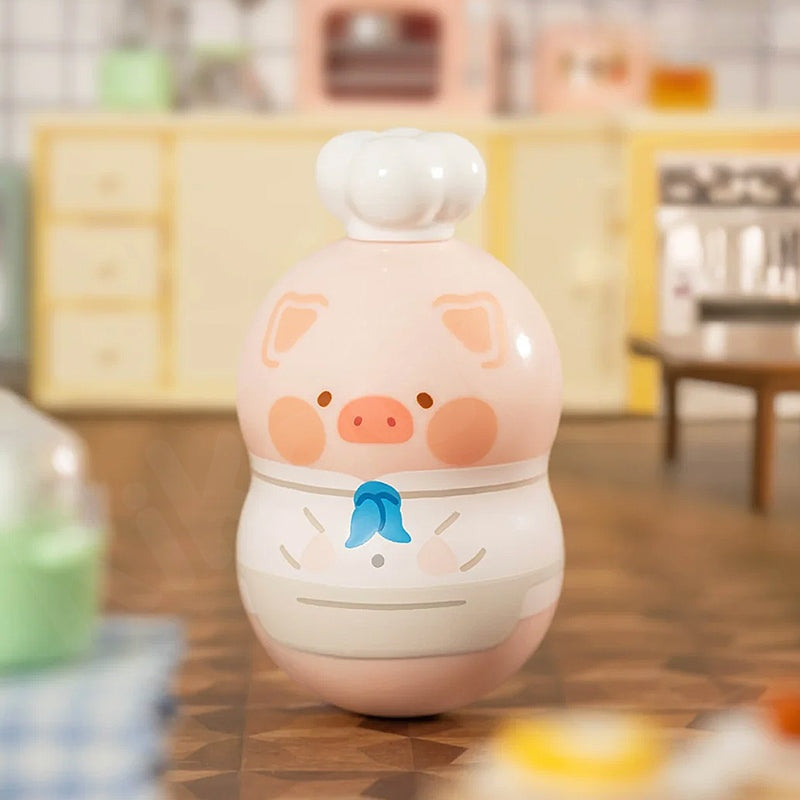 Cute pig-shaped container on a wooden surface with a blurred background