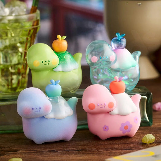 Set of colorful cartoon-like figurines on a wooden surface with a blurred background