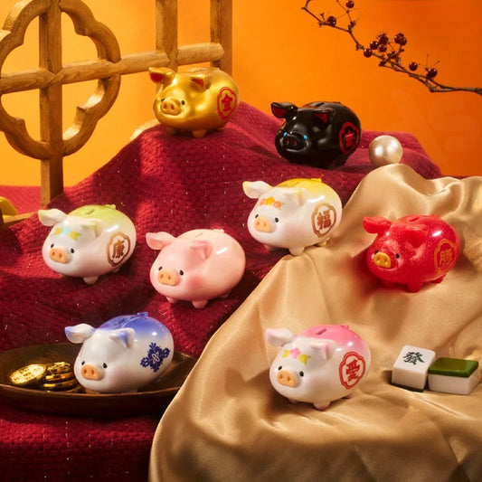 Collection of colorful pig-shaped figurines on a textured surface with an orange background.