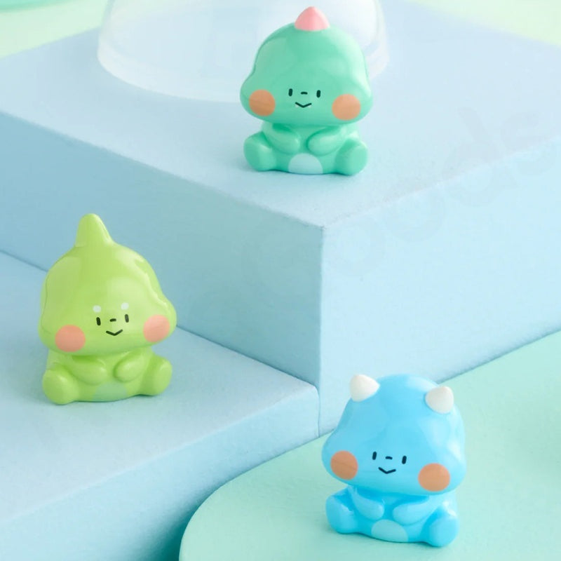 Three colorful cartoon-like figurines on a light blue geometric background