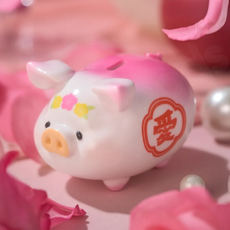 Pink piggy bank with decorative elements on a pink background