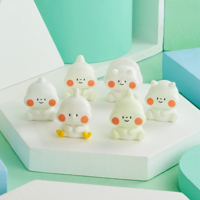 Set of cute ghost figurines with orange accents on a geometric background