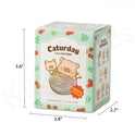 Box packaging of a product with 'Caturday' branding and a pig illustration.