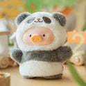 Plush toy resembling a panda with a blurred background