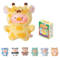 Plush toy giraffe with a box of additional plush toys on a white background