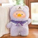 Plush toy in a purple outfit with a white face and orange nose on a wooden floor.